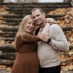 The vintage-style photo captures the heartfelt connection and joy of the moment.