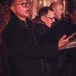 The the vintage choir conductor passionately leads the choir, capturing the emotional essence of a c.