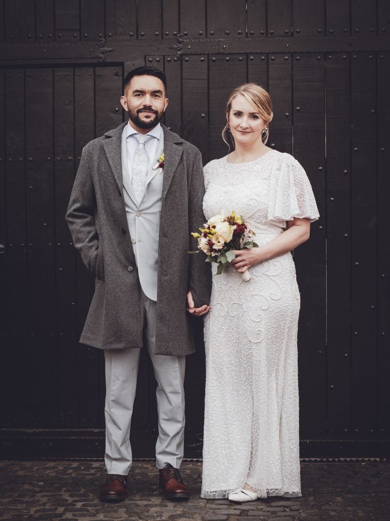 A heartfelt vintage wedding scene featuring a couple in elegant attire, symbolizing love and timeless romance on their special day.